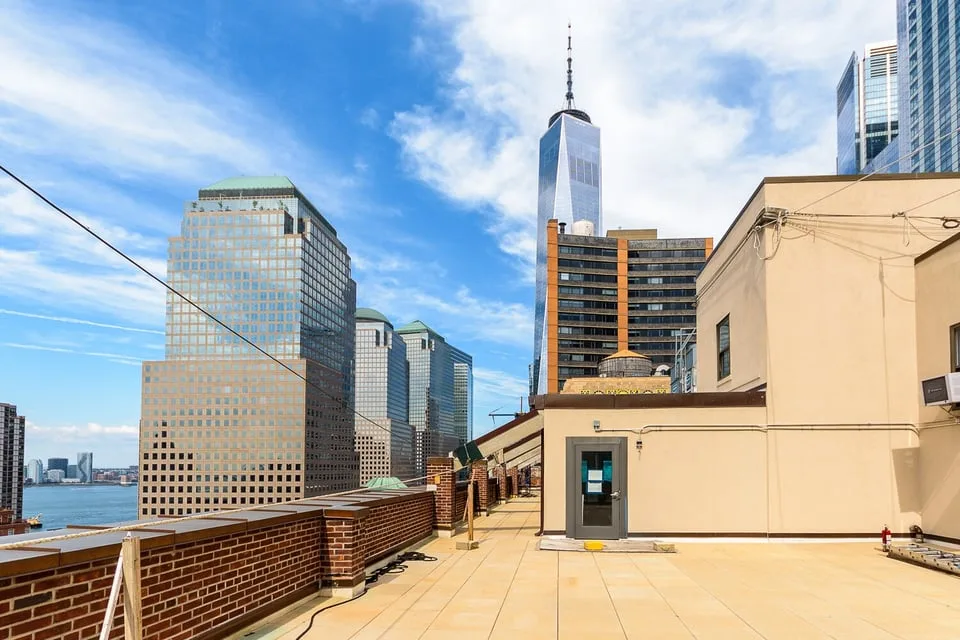 Duplex Penthouse Commercial Condo with Skyline and Harbor Views in Financial District