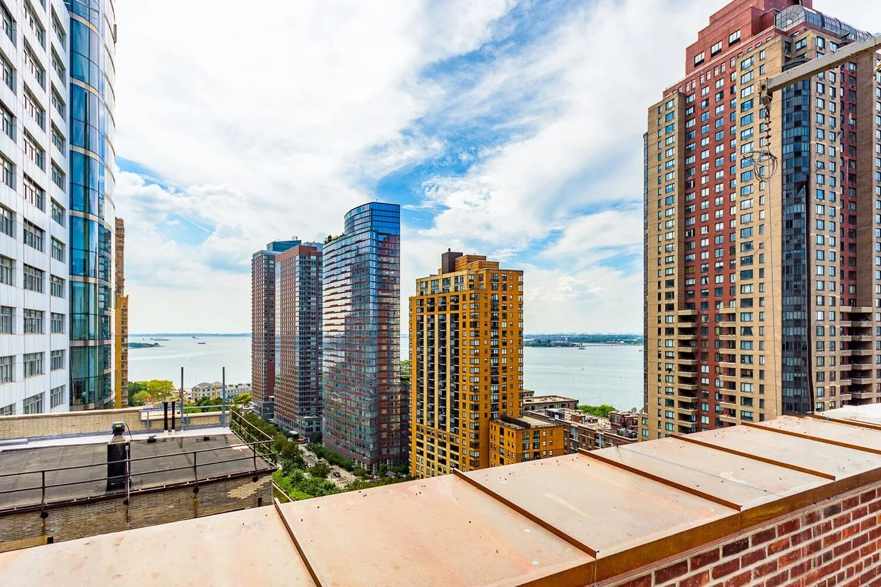 Duplex Penthouse Commercial Condo with Skyline and Harbor Views in Financial District 18